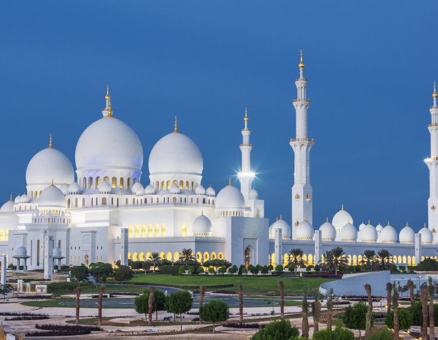 View of famous Abu Dhabi Sheikh Zayed Mosque by night, UAE.